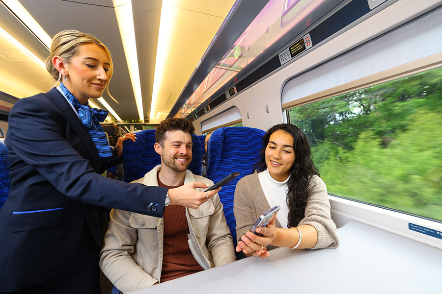 Lumo staff checking passenger tickets