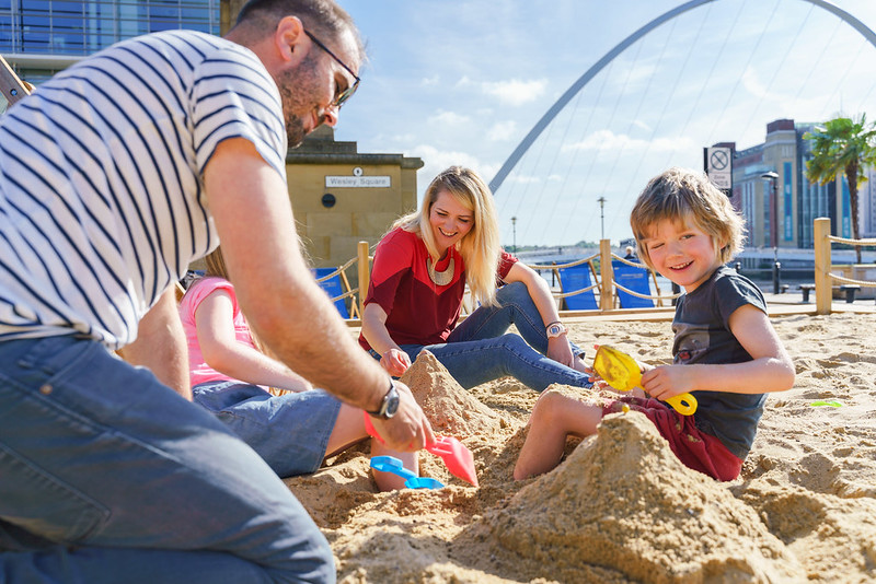 Family travelling by train to Newcastle