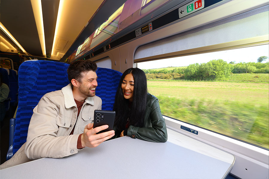 Passengers checking their phone