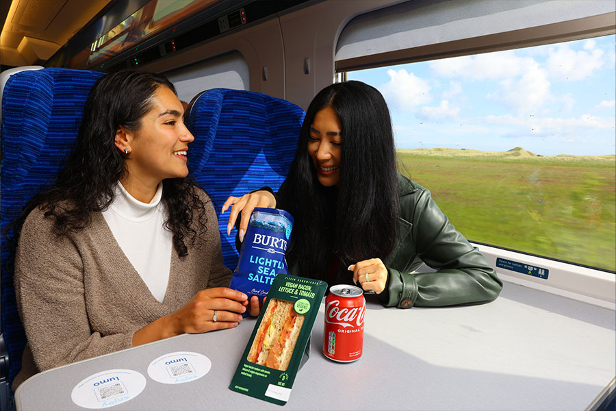 Passengers snacking on the train