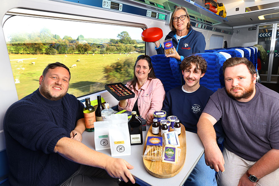 Group of people showing food on a Lumo train