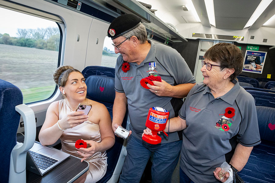 Man selling poppies onboard