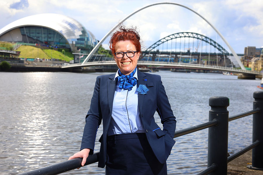 Lumo staff member with new uniform in Newcastle Quayside