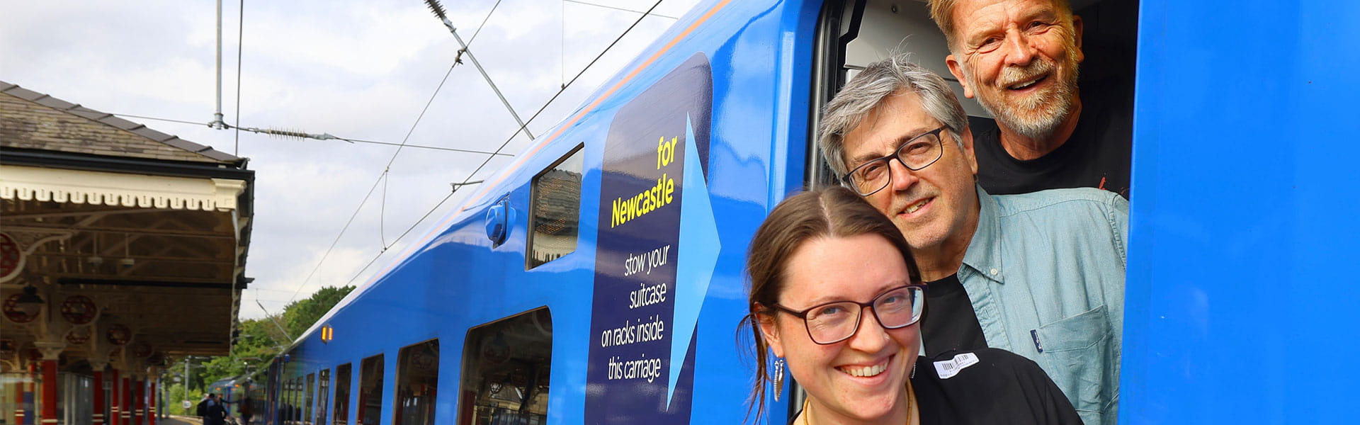 Authors Natalie Jayne Clark, Gordon Brown and Douglas Skelton boarding a Lumo train