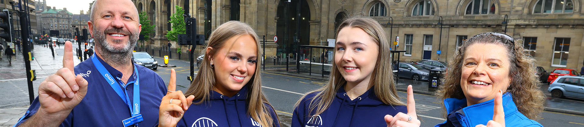 Lumo ambassadors pictured with placement students from Newcastle College outside of Newcastle Station