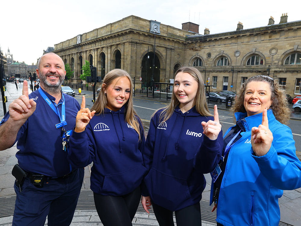 Lumo ambassadors pictured with placement students from Newcastle College outside of Newcastle Station
