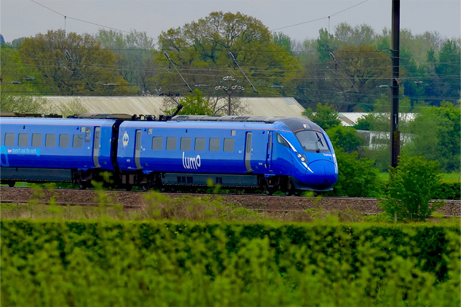 Lumo train going through the countryside