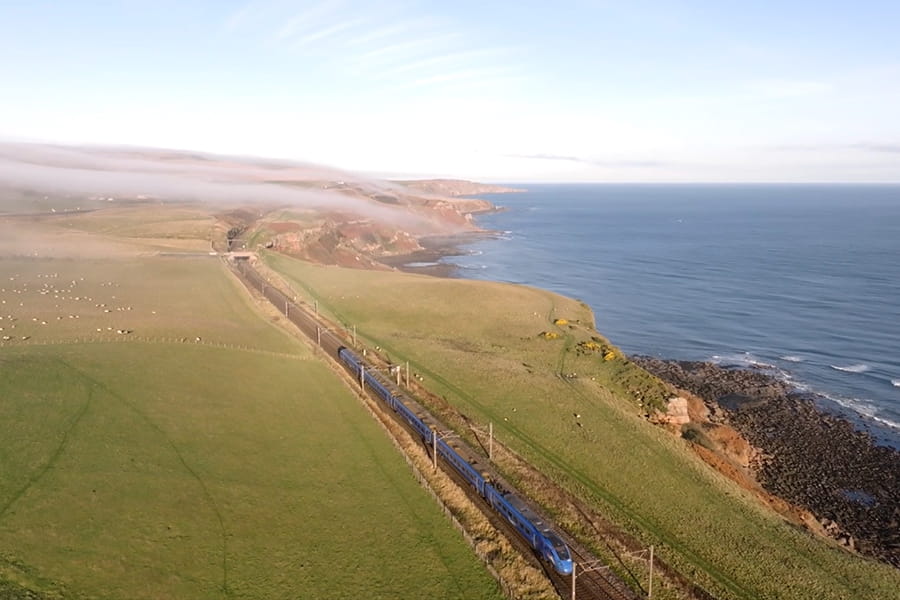 Lumo train going through Scotland