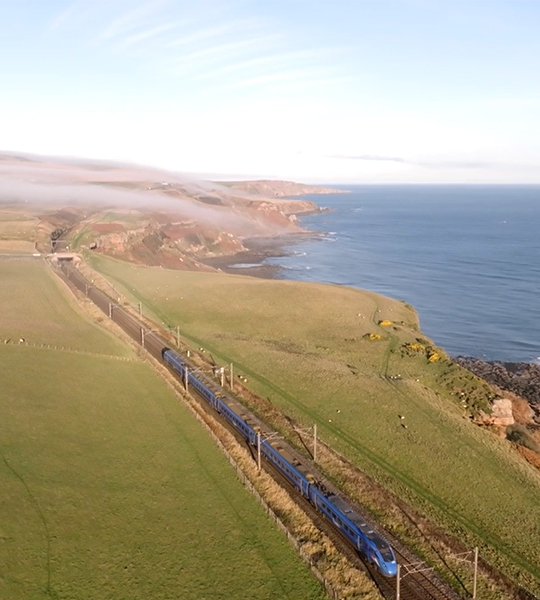 Lumo train going through Scotland